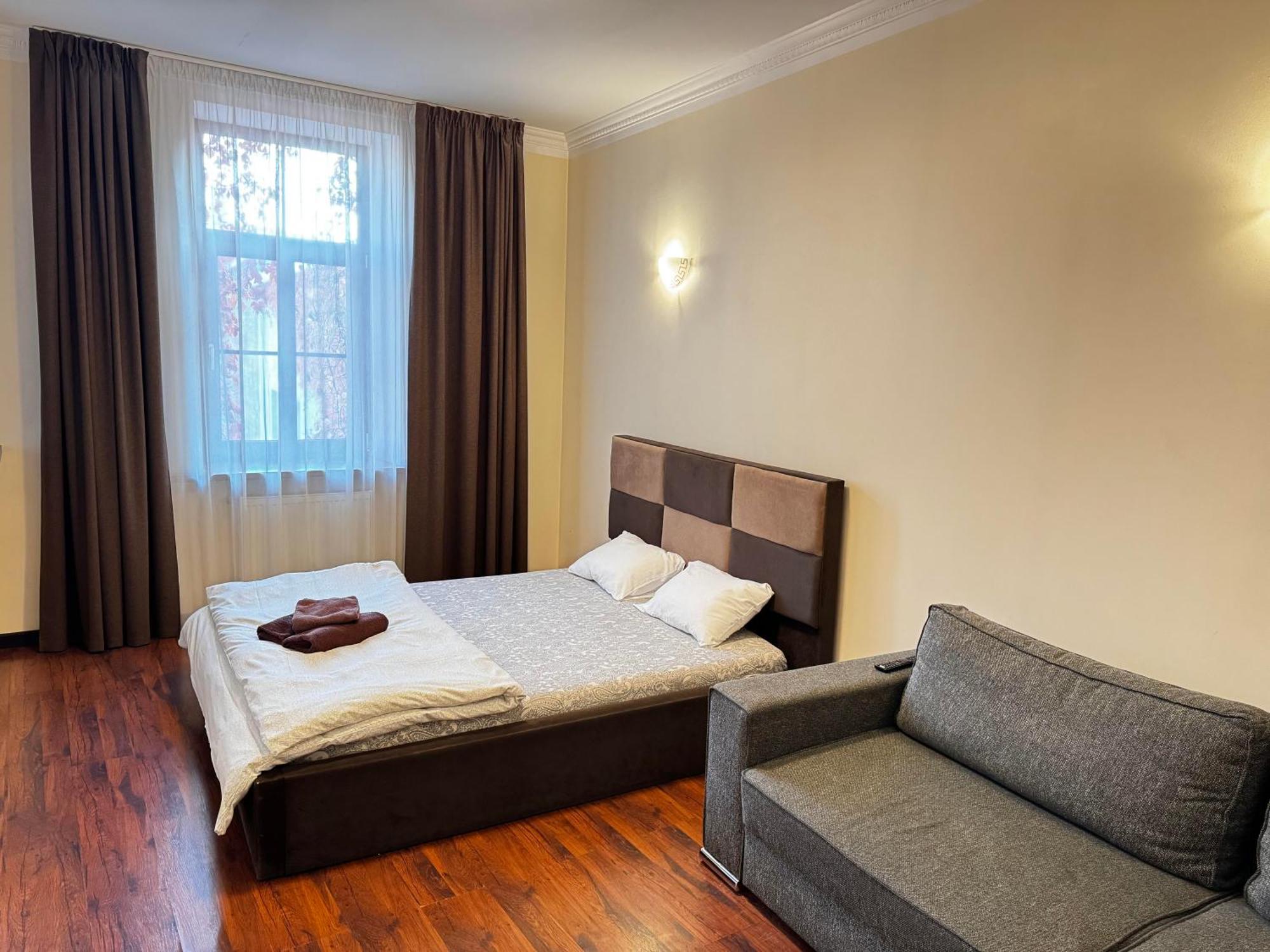 里加公寓式酒店 外观 照片 A bedroom in a hotel