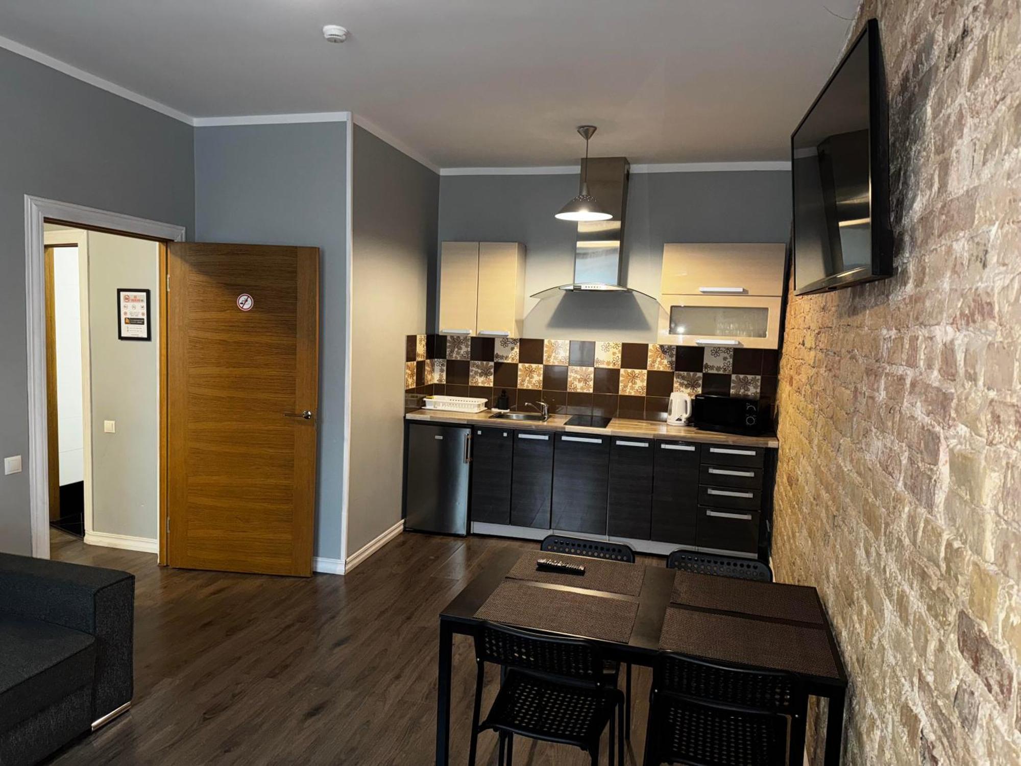 里加公寓式酒店 外观 照片 A typical apartment at the University of Applied Sciences and Medical University of Southern Tyrol