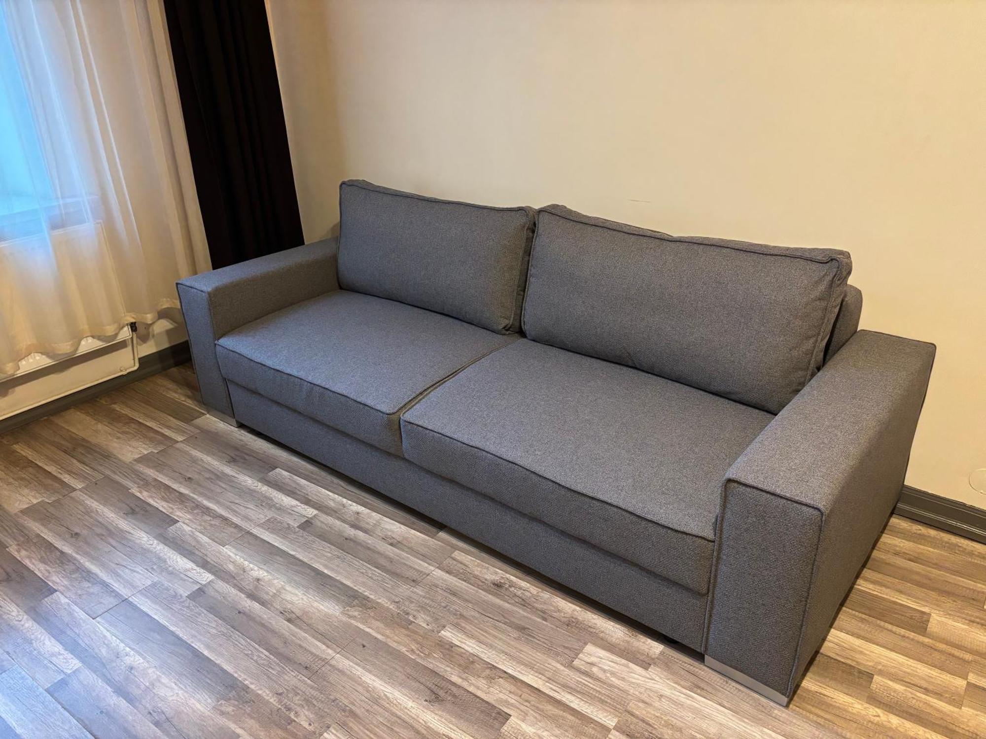 里加公寓式酒店 外观 照片 A sofa